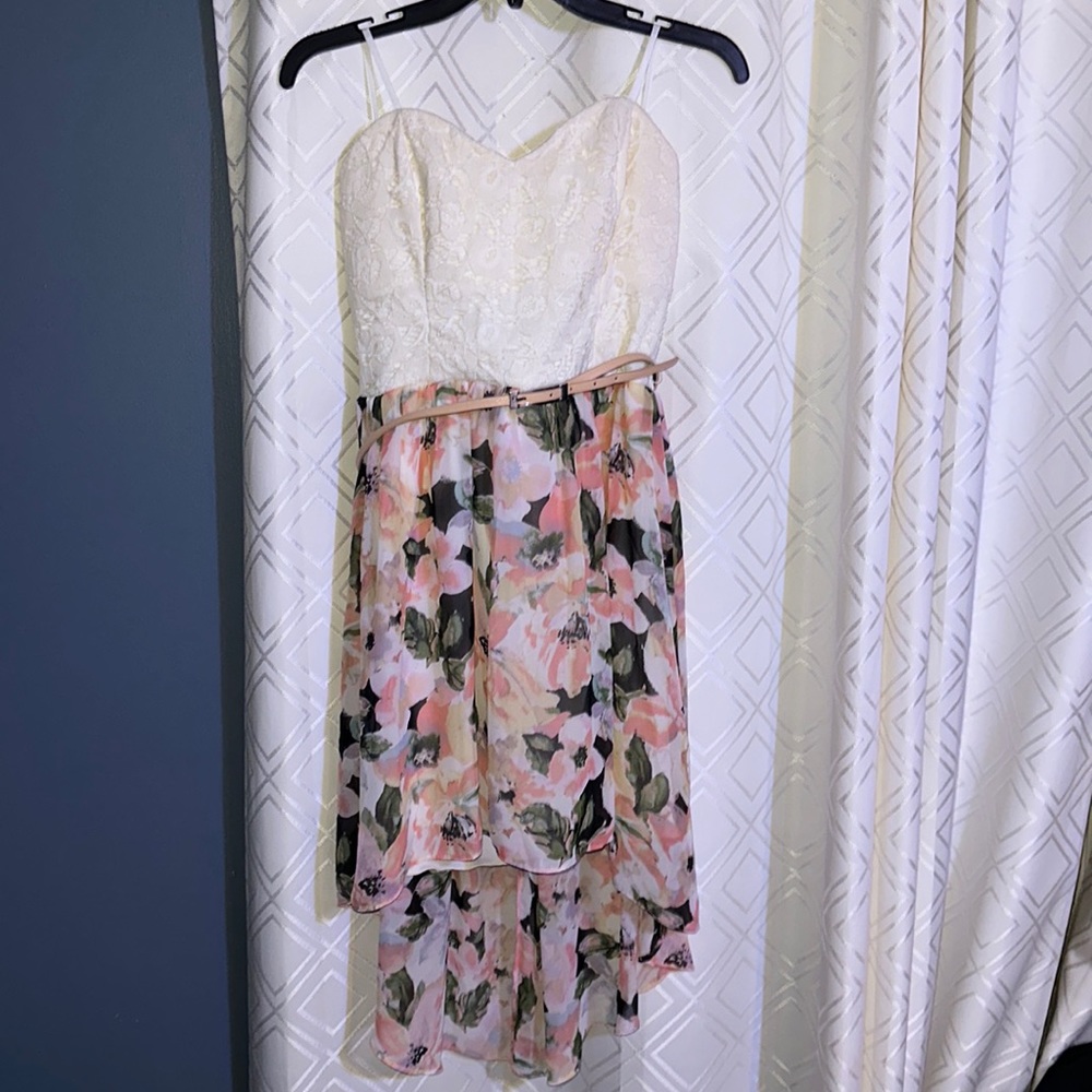 Nice high low dress with pink belt!